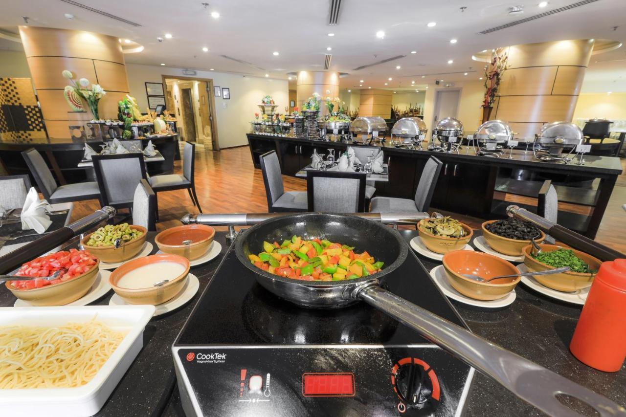 מכה Elaf Al Mashaer Hotel Makkah מראה חיצוני תמונה The hotel's restaurant